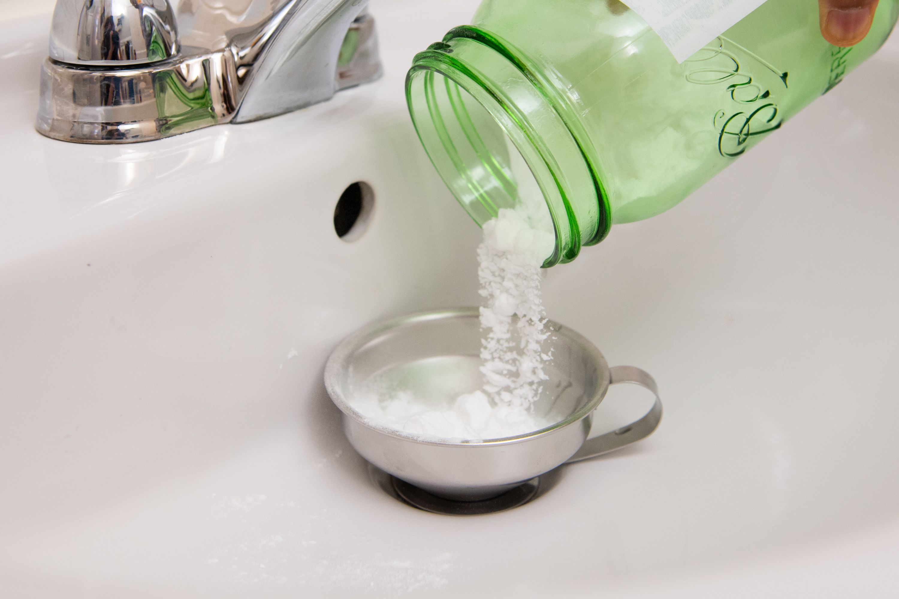 How to Freshen and Unclog a Drain With Baking Soda