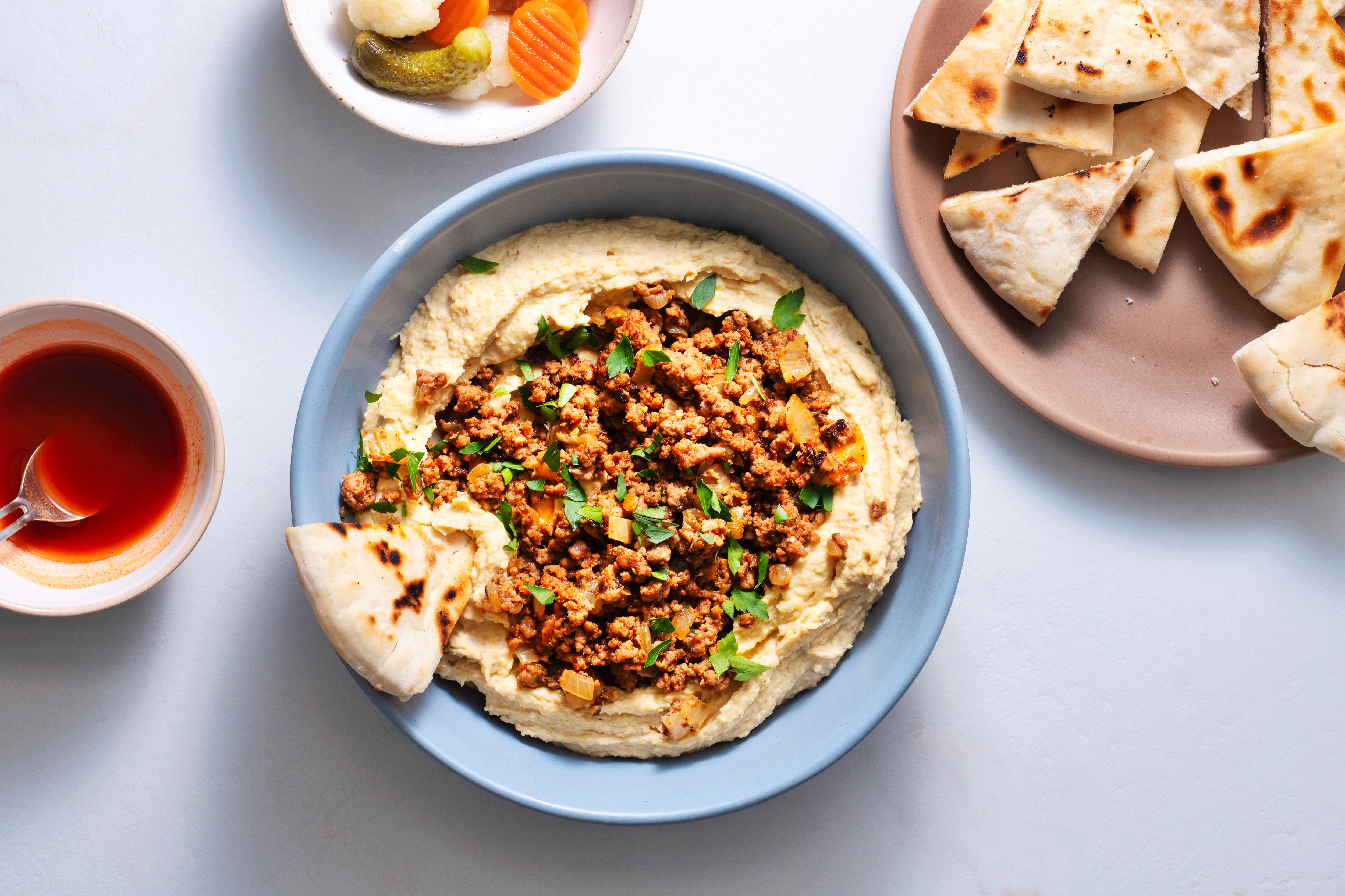 Spiced Beef Over Hummus