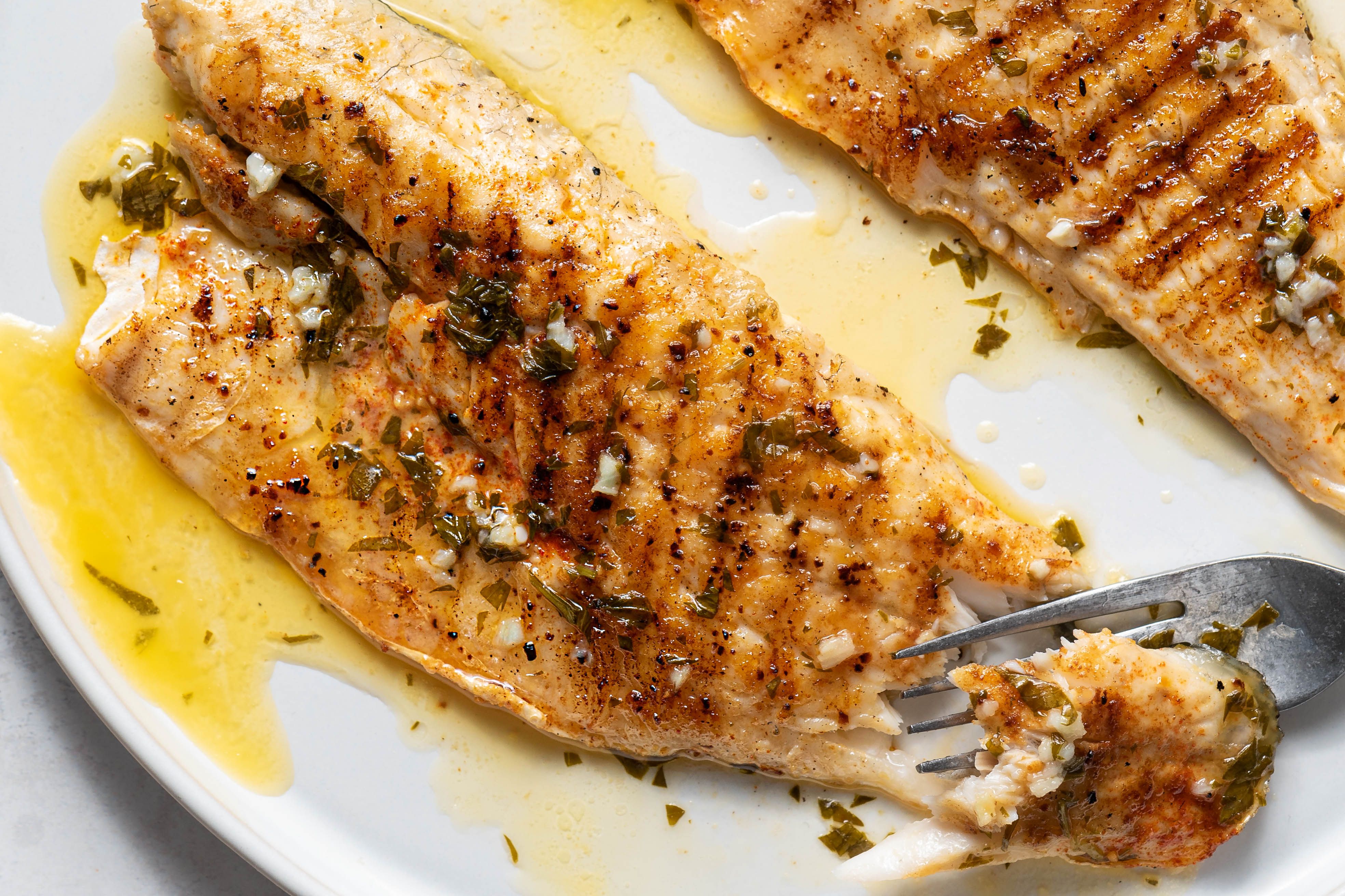 Grilled Sea Bass With Garlic Butter